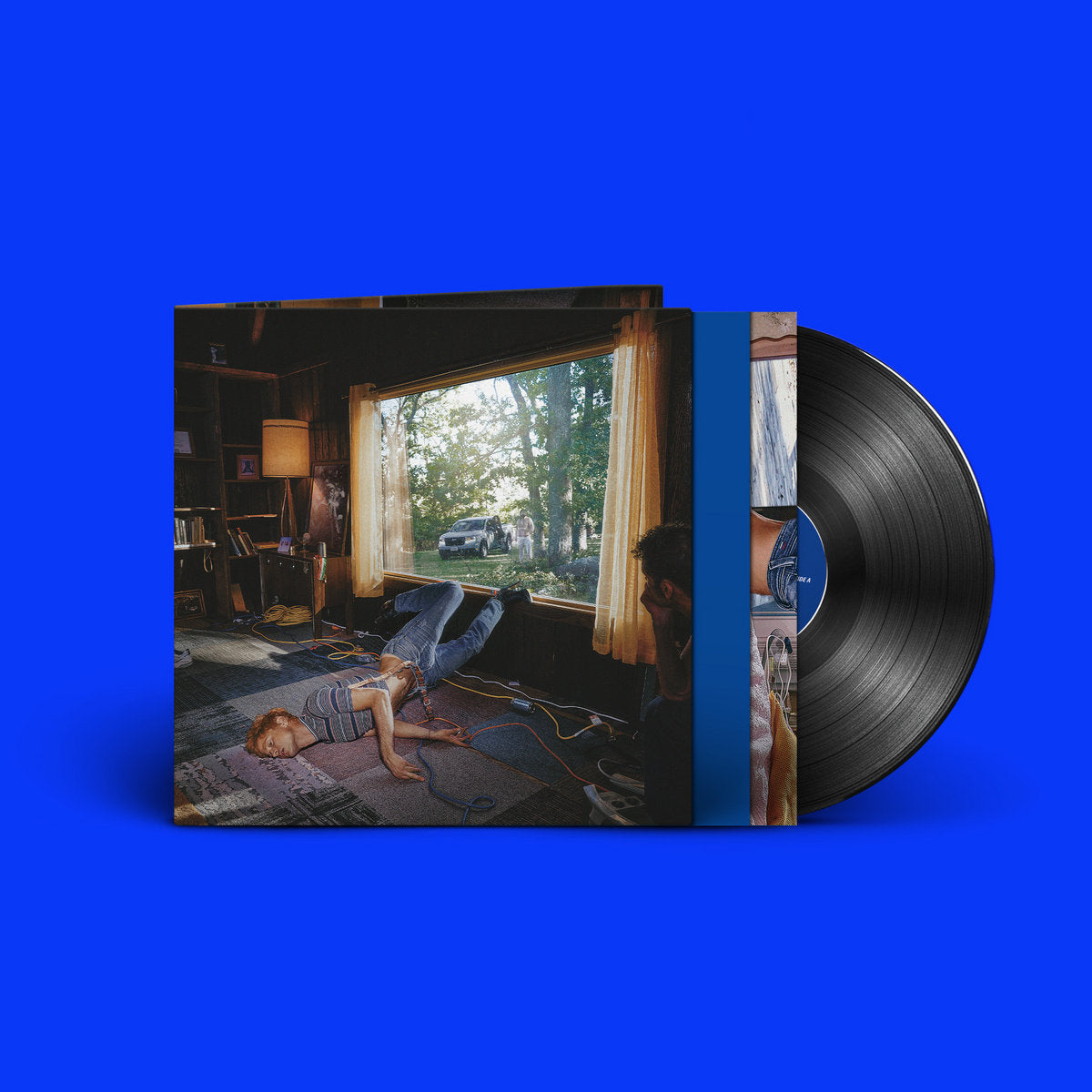 Black vinyl LP of Perfume Genius - Glory, a rock and indie album, on Matador Records, with the record sleeve and label visible.