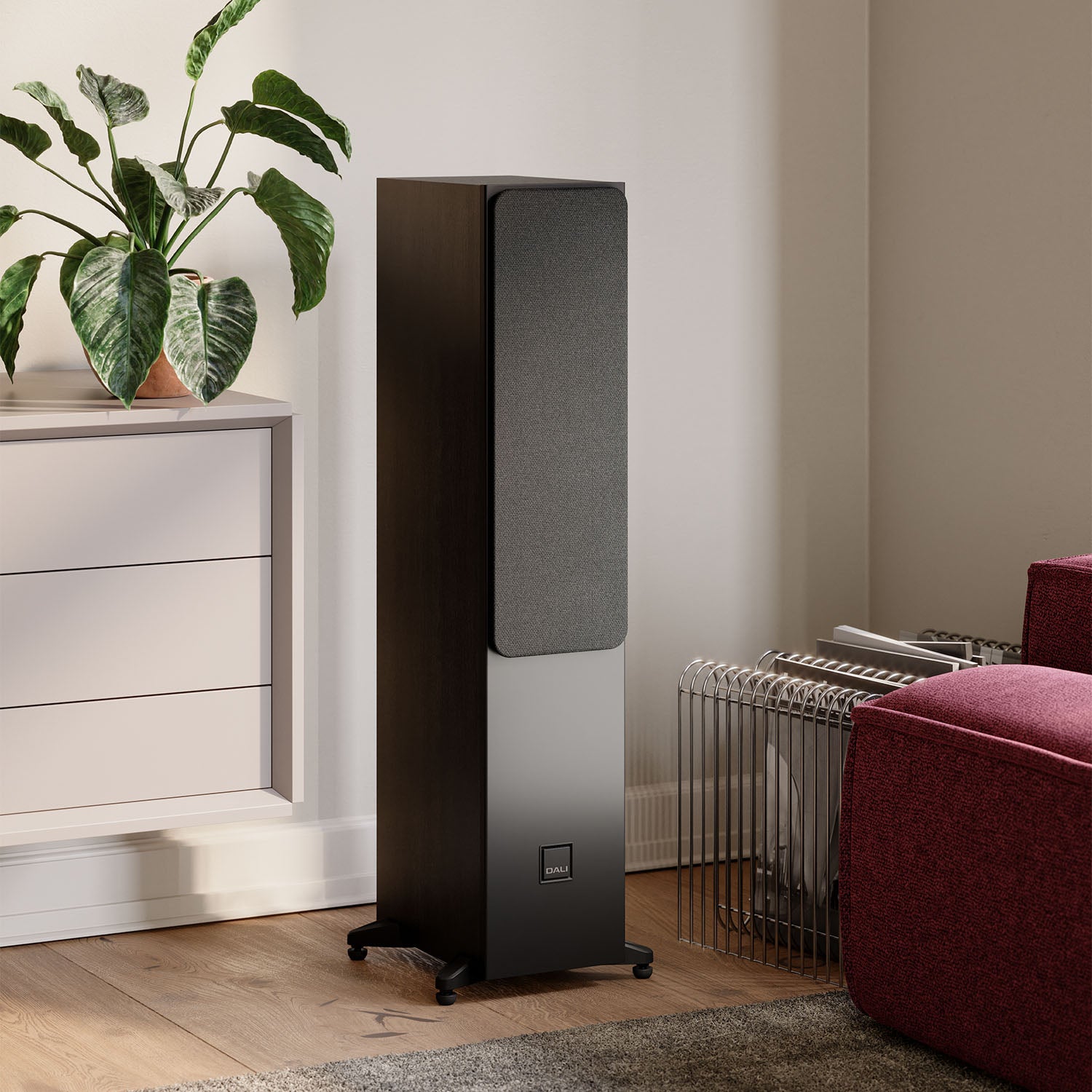 DALI Sonik 5 passive floorstanding speakers with sleek black cabinets and multiple driver units for rich sound.