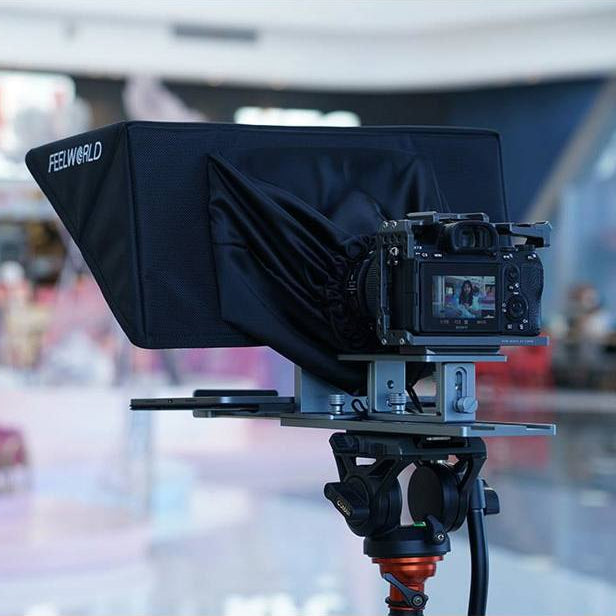 Feelworld TP16 teleprompter with adjustable glass and camera mount, ideal for professional video recording and live presentations.