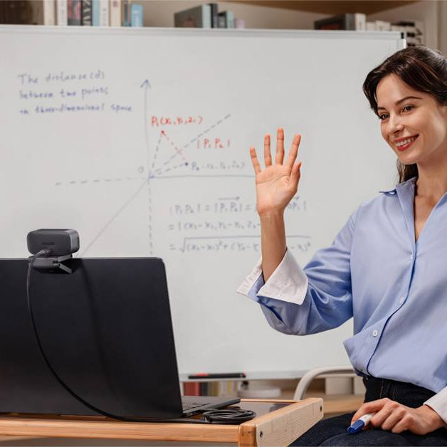 Insta360 Link 2C Pro video conferencing camera with 1060w lens, sleek black design, and adjustable mounting for professional meetings.