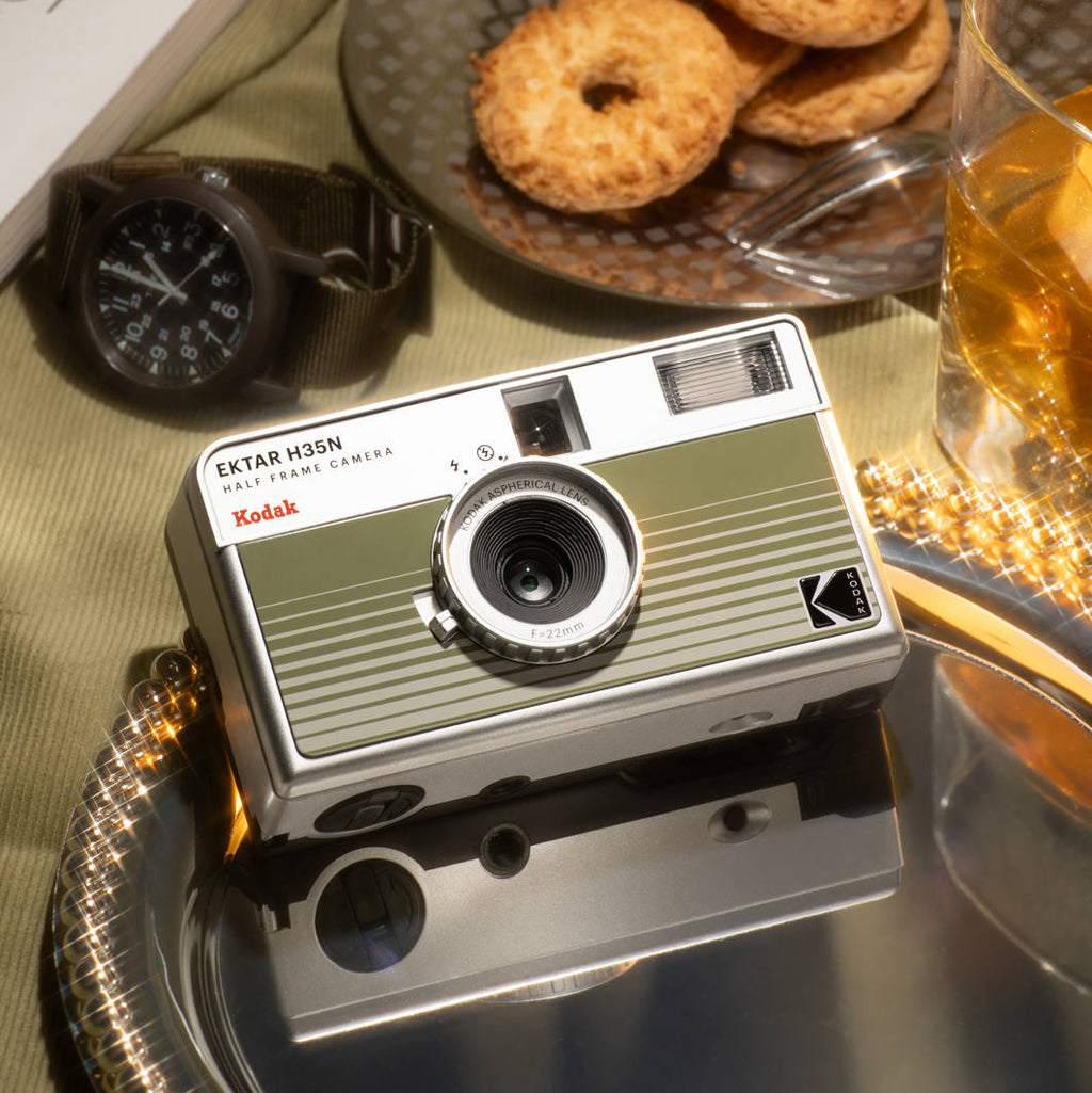 Kodak EKTAR H35N compact instant camera with black body, ready for quick and easy instant photo capturing.