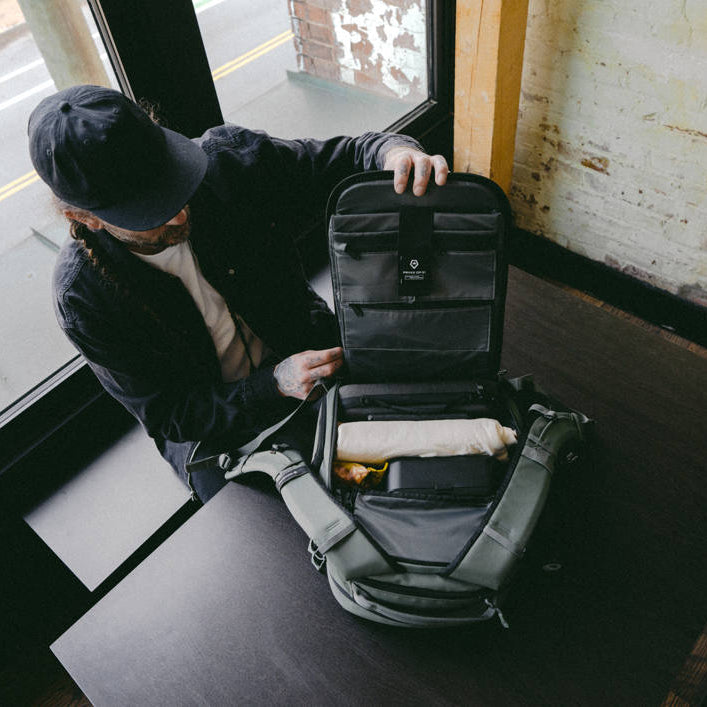 Wandrd Prvke Zip video equipment bag with multiple compartments and padded interior for safe camera gear storage.