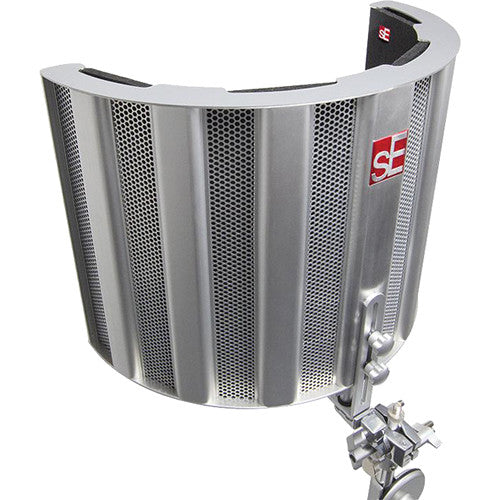 SE Electronics Reflexion Filter Space reflection filter for vocal recording, with foam padding and metal frame on a stand.
