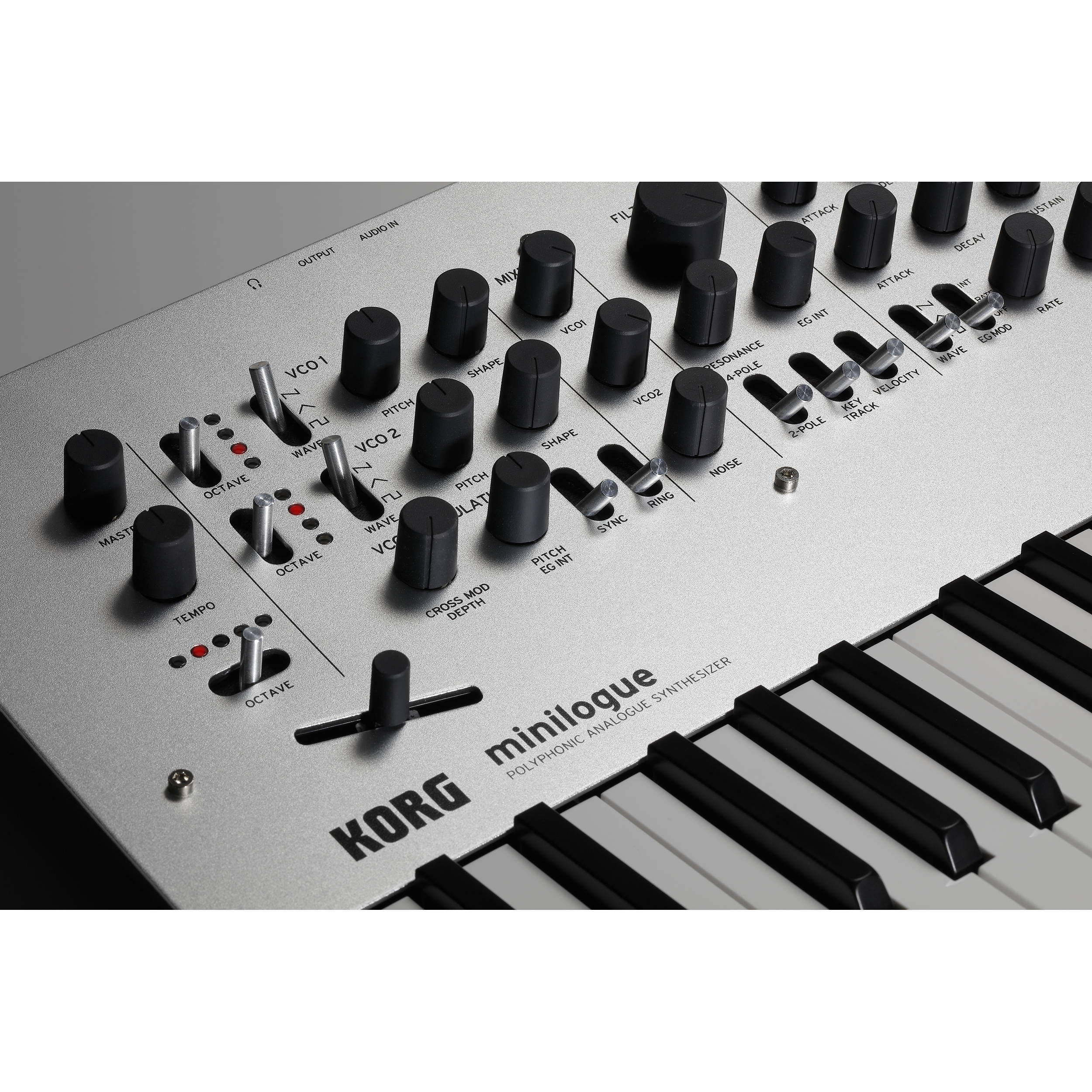 Korg Minilogue synthesizer with control knobs and keyboard, showcasing its compact design and versatile sound capabilities.