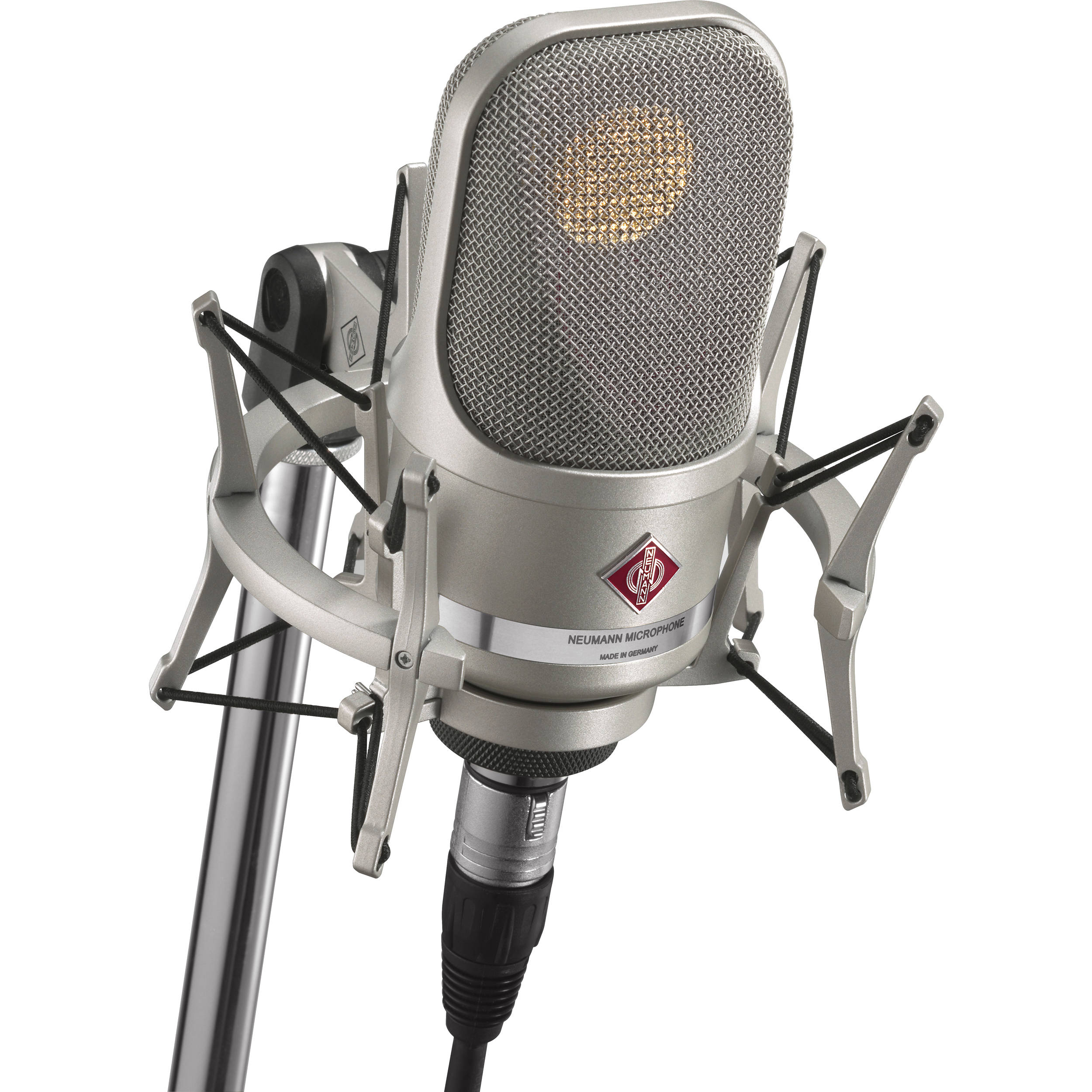 Neumann TLM 107 condenser microphone studio set with microphone, shock mount, and cables on a neutral background.