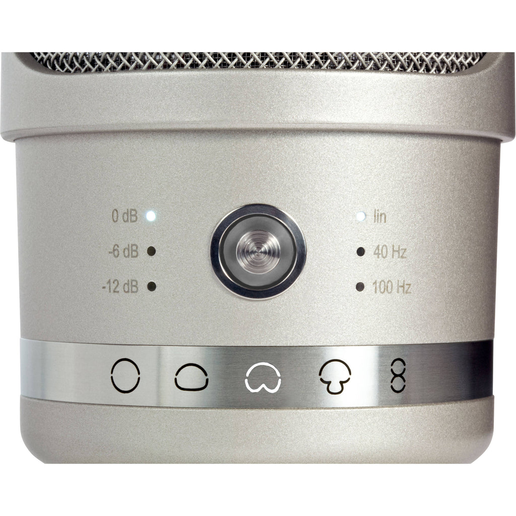 Neumann TLM 107 condenser microphone studio set with microphone and accessories on a professional recording setup.