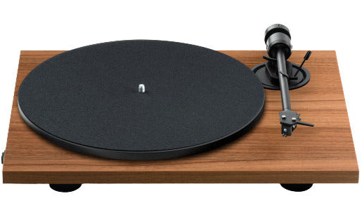 Pro-Ject E1.2 turntable with wooden plinth, tonearm, and platter, showcasing its sleek design and components.