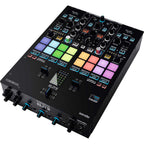 Reloop ELITE DJ mixer with multiple channels, control knobs, and display screens for professional DJ setups.