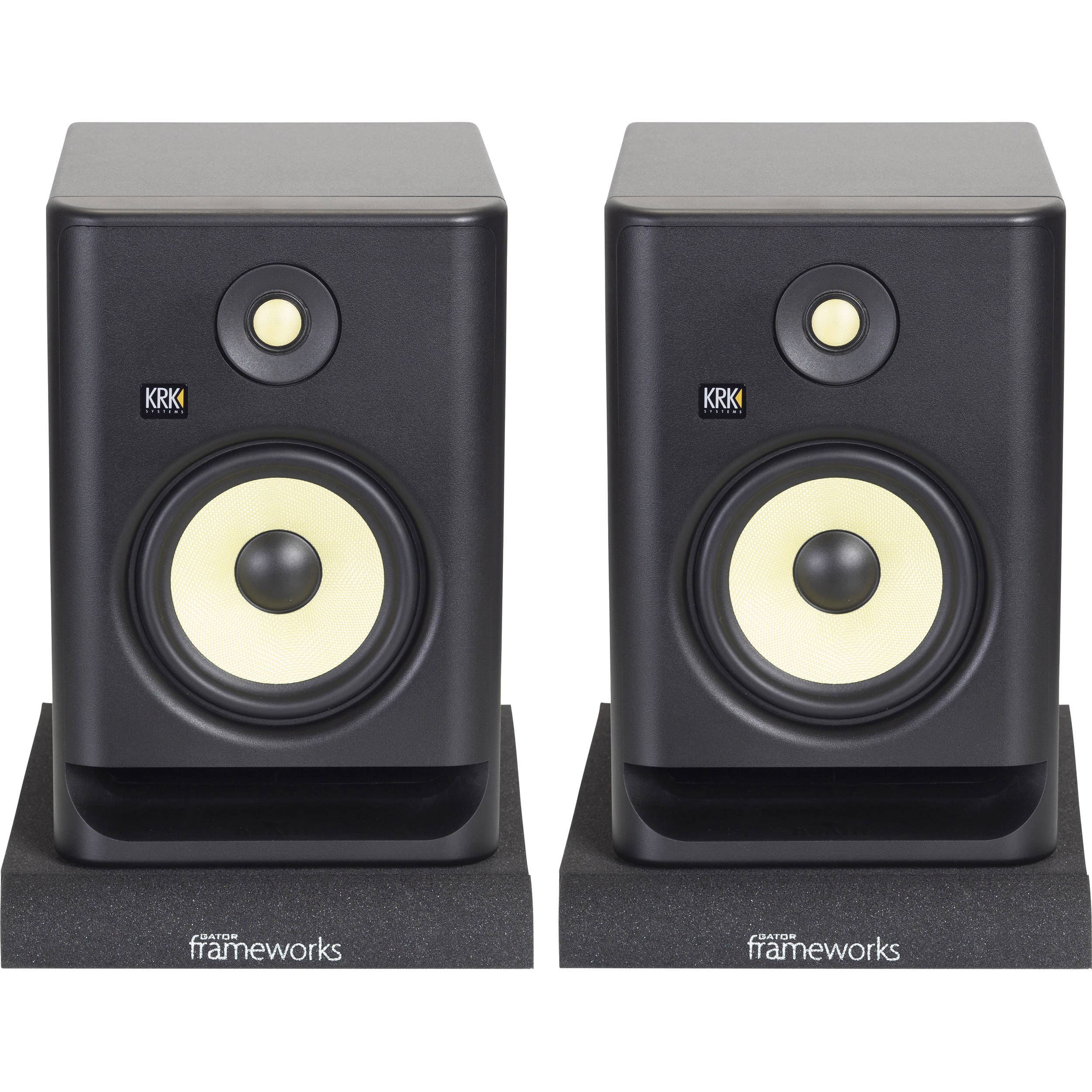 Gator Studio Monitor Isolation Pads placed on studio monitor stands to reduce vibrations and improve sound clarity.