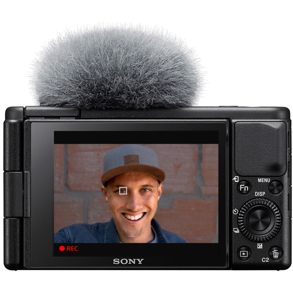 Sony ZV-1 compact video camera with lens and flip-out screen, ideal for vlogging and high-quality video recording.
