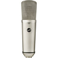 Warm Audio WA-87 R2 condenser microphone on a stand, showing its vintage-inspired design and large diaphragm for studio recording.