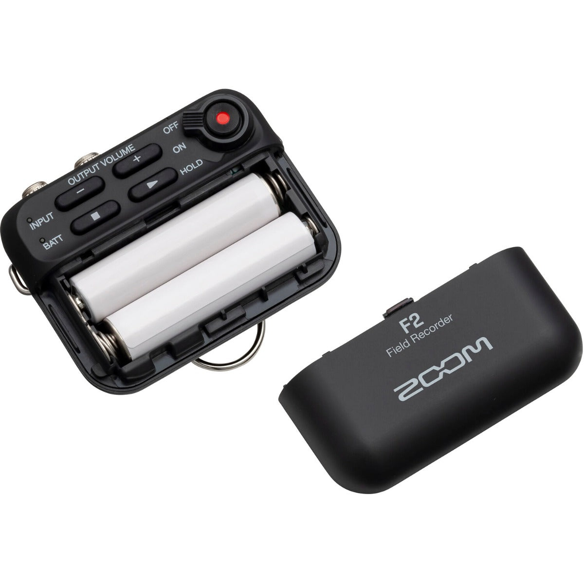 Zoom F2 digital recorder with compact design and multiple input options, shown with attached microphone and controls.