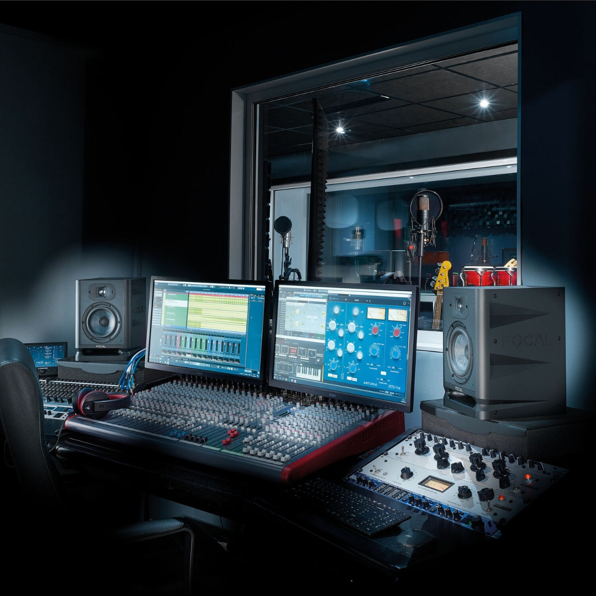 Focal Alpha 65 Evo active nearfield monitor speaker with black finish and control knobs on front panel.