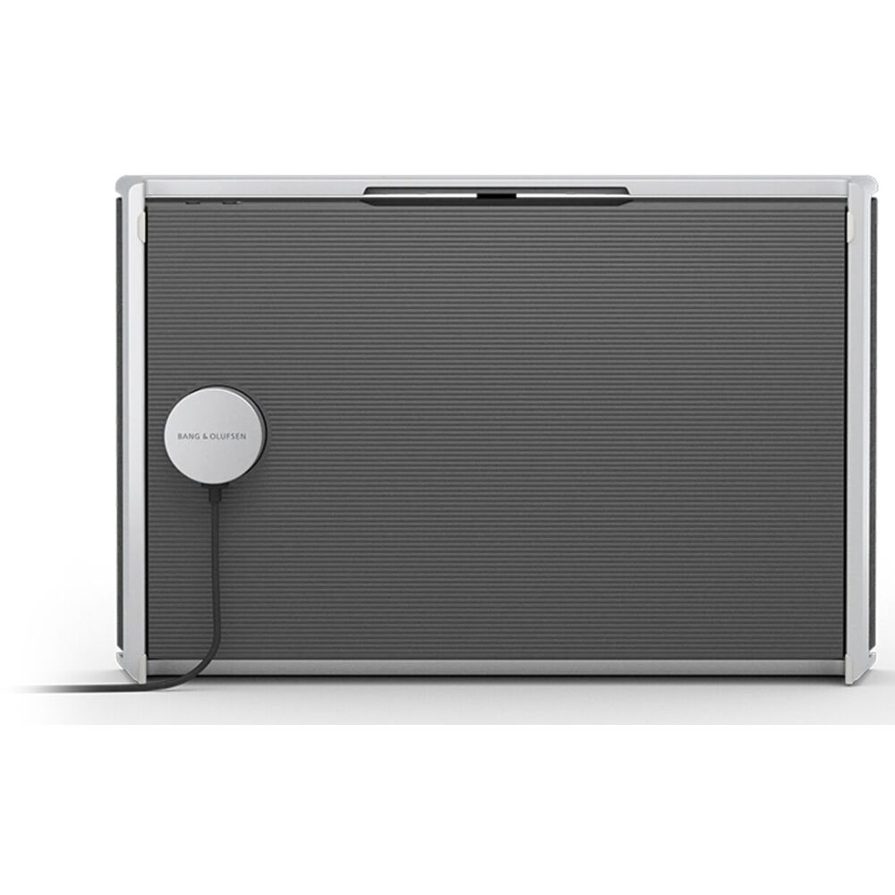 Wireless Bang & Olufsen Beosound Level speaker with sleek design and fabric covering, showcasing modern home audio equipment