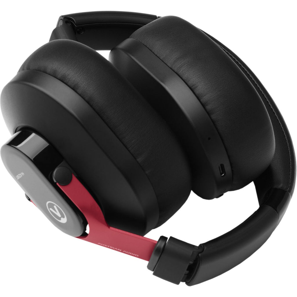 Austrian Audio Hi-X25BT wireless headphones with over-ear design, black ear cups, and headband, resting on a white background.