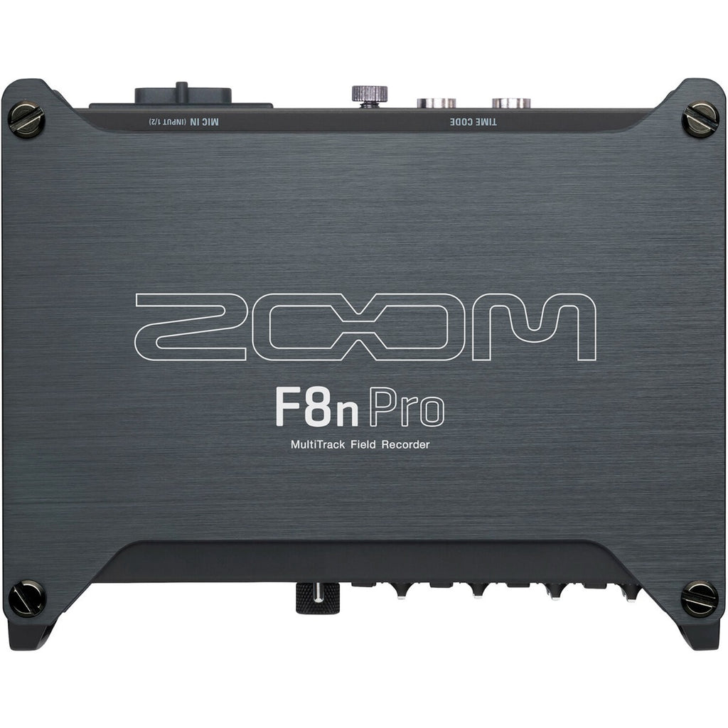 Zoom F8n Pro digital recorder with multiple input channels and a sleek design, displayed on a wooden surface.