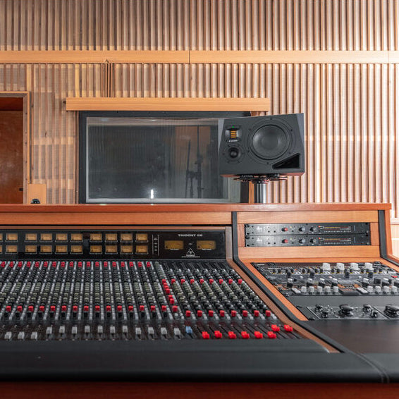 Adam Audio A8H right mid-field and main studio monitor speaker with detailed front grille and control panel.