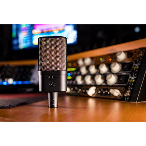 Austrian Audio OC16 condenser microphone set with microphone, stand, and accessories for studio recording.