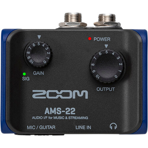 Zoom AMS-22 audio interface with multiple input/output ports and sleek design on a white background.