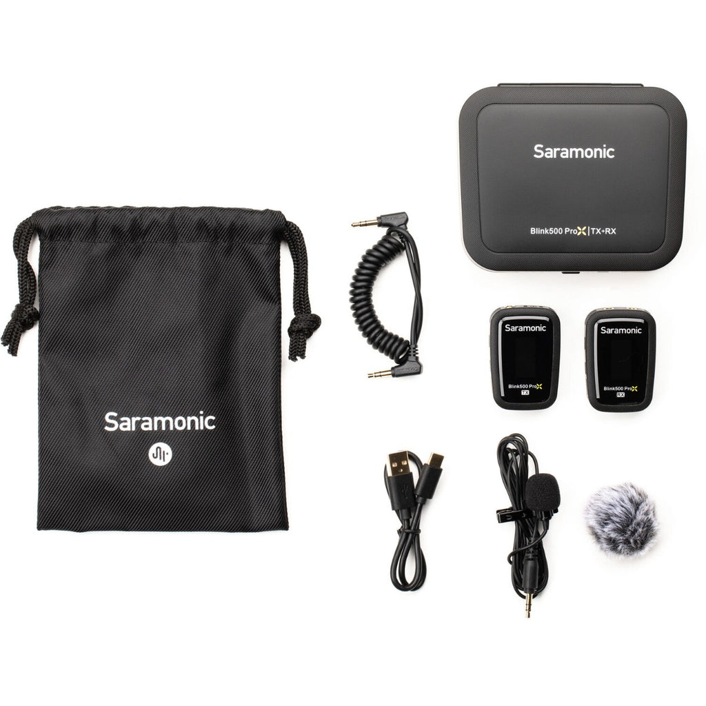 Saramonic Blink500 ProX B1 wireless microphone system for creators, featuring compact transmitter and receiver units on a table.