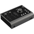 Audient iD24 audio interface with multiple input/output ports and sleek black design, used for professional music recording.