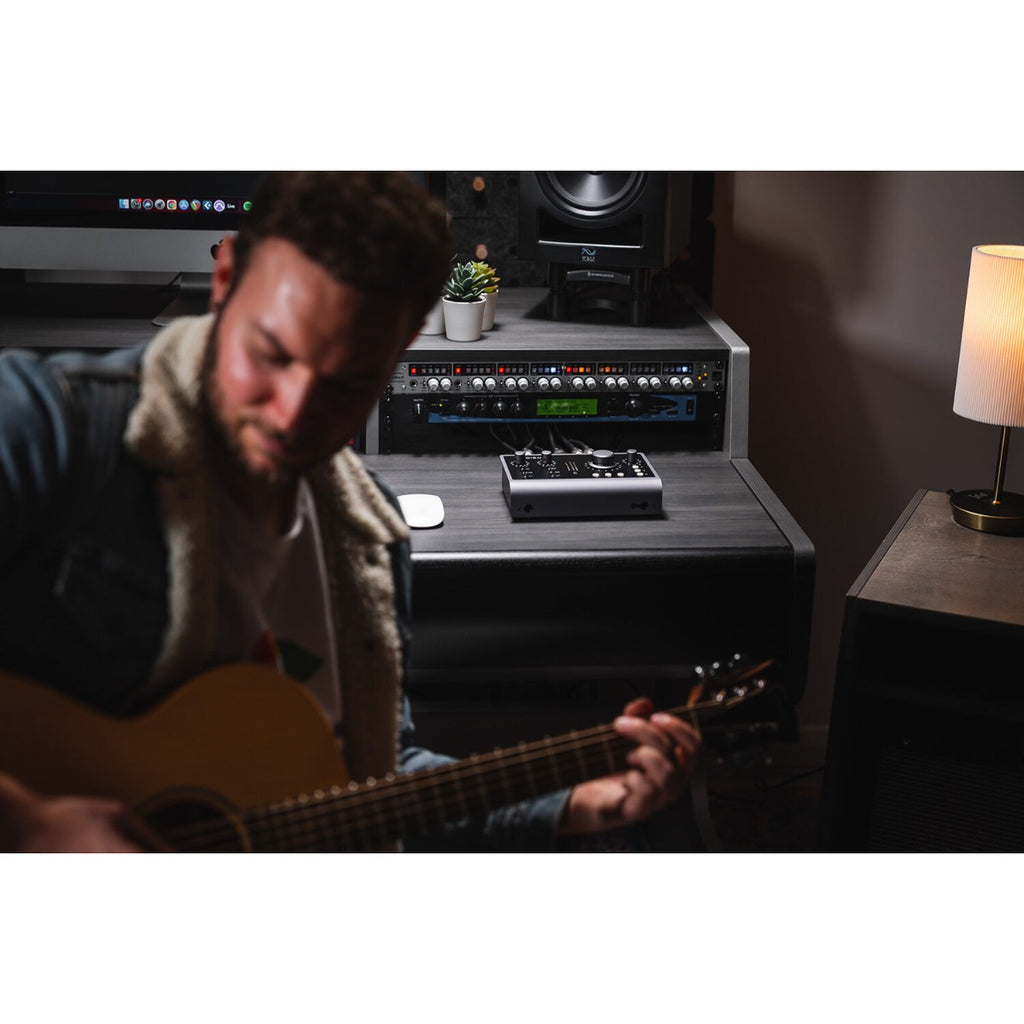 Audient iD24 audio interface with multiple input and output ports, compact design, and professional-grade controls.