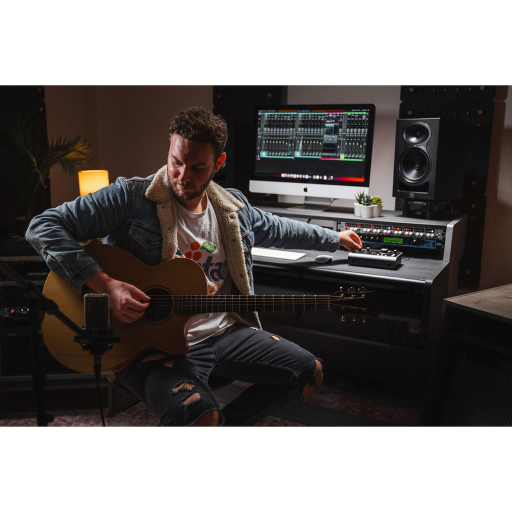 Audient iD24 audio interface with multiple input and output ports, compact design, and professional-grade controls.