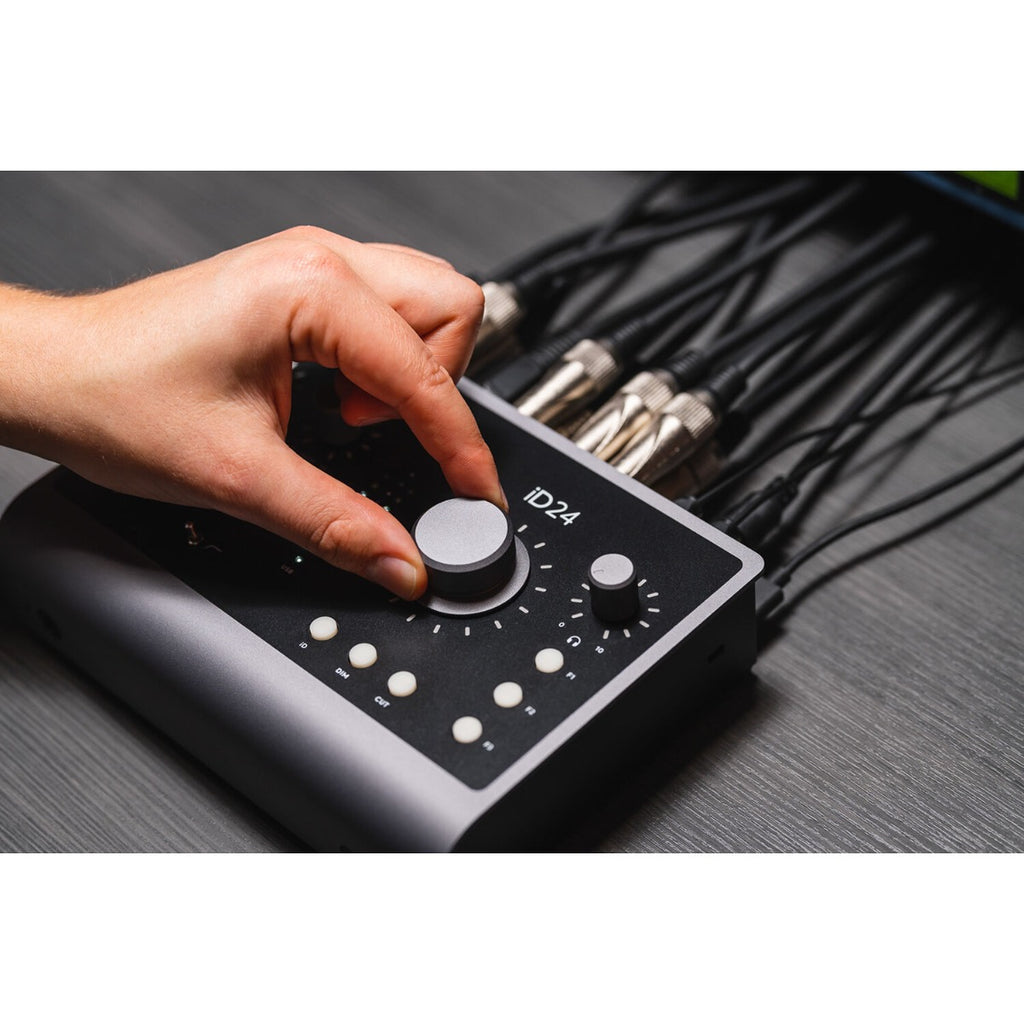 Audient iD24 audio interface with multiple input and output ports, compact design, and professional recording features.