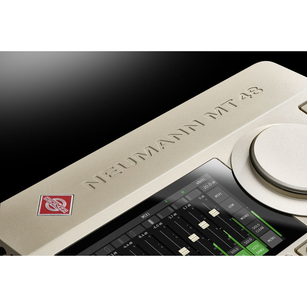 Neumann MT 48 audio interface with multiple input and output ports, compact design, and professional-grade audio equipment.