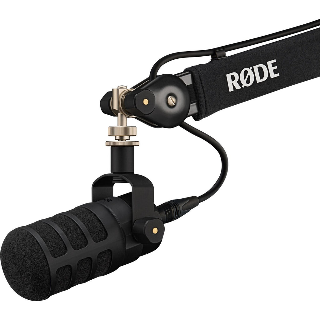 Rode Podmic USB microphone with black grille and compact design, ideal for podcasting and home recording setups