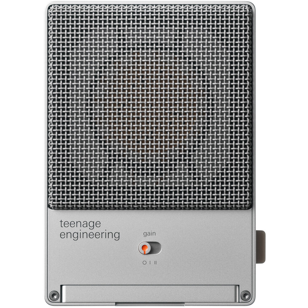 Teenage Engineering CM-15 condenser microphone shown with sleek metal body and professional audio input for recording.