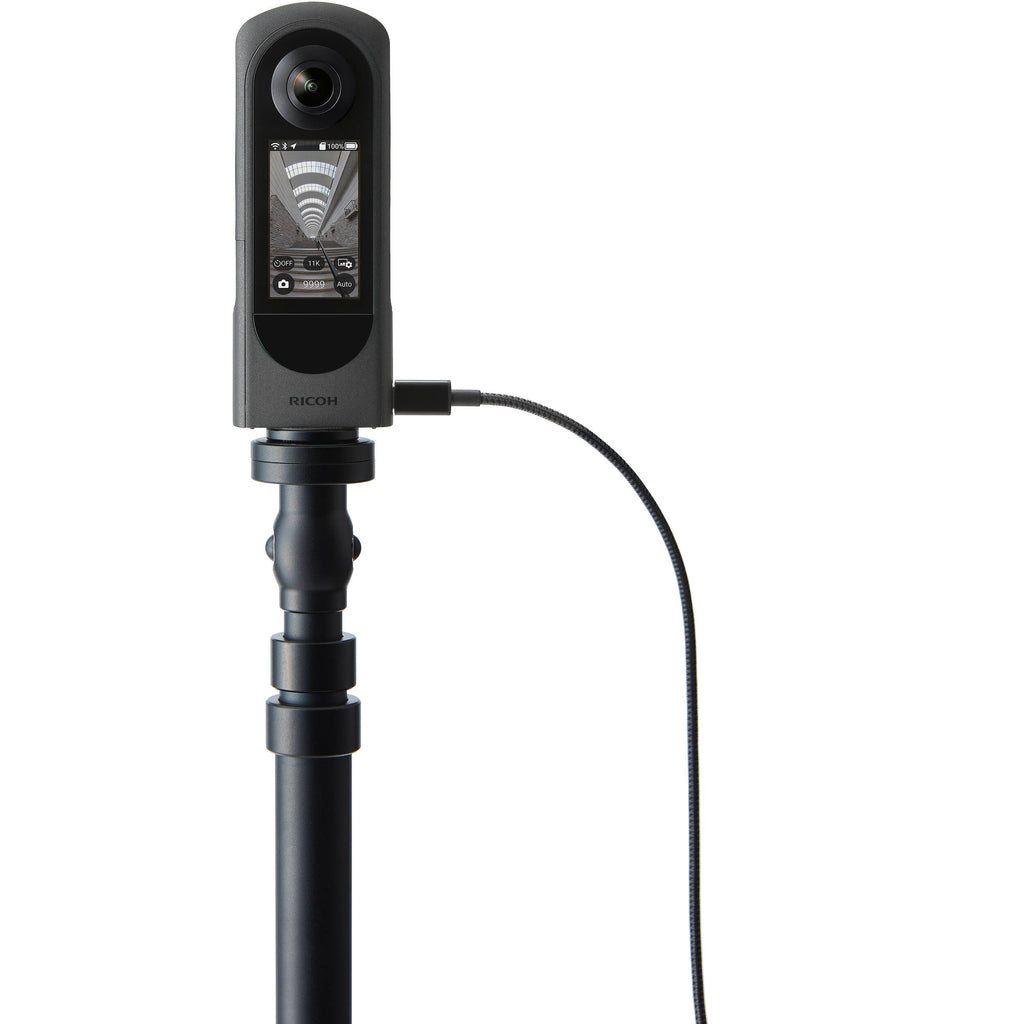 Ricoh Theta X 360-degree video camera with dual lenses and compact design for immersive virtual reality content.