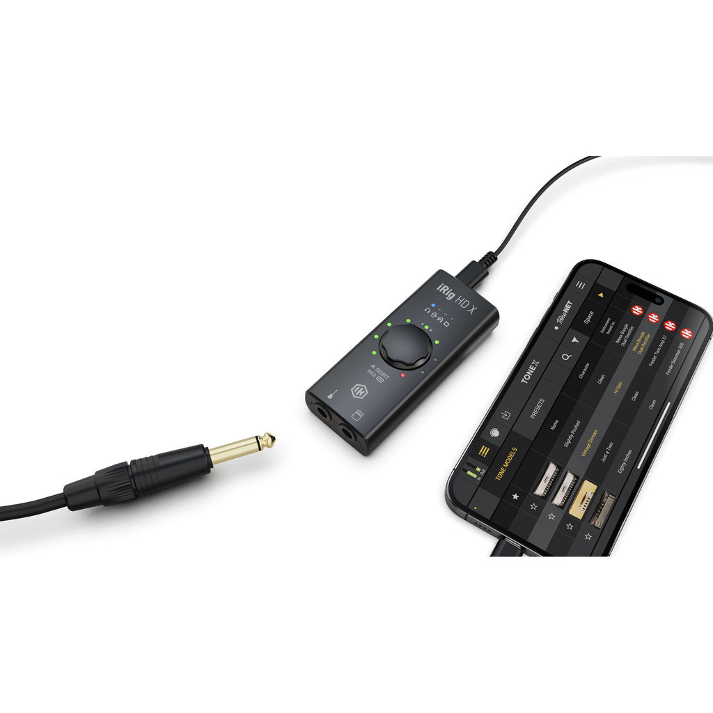 IK Multimedia iRig HD X audio interface with USB connection and input/output ports for guitar and instrument recording.
