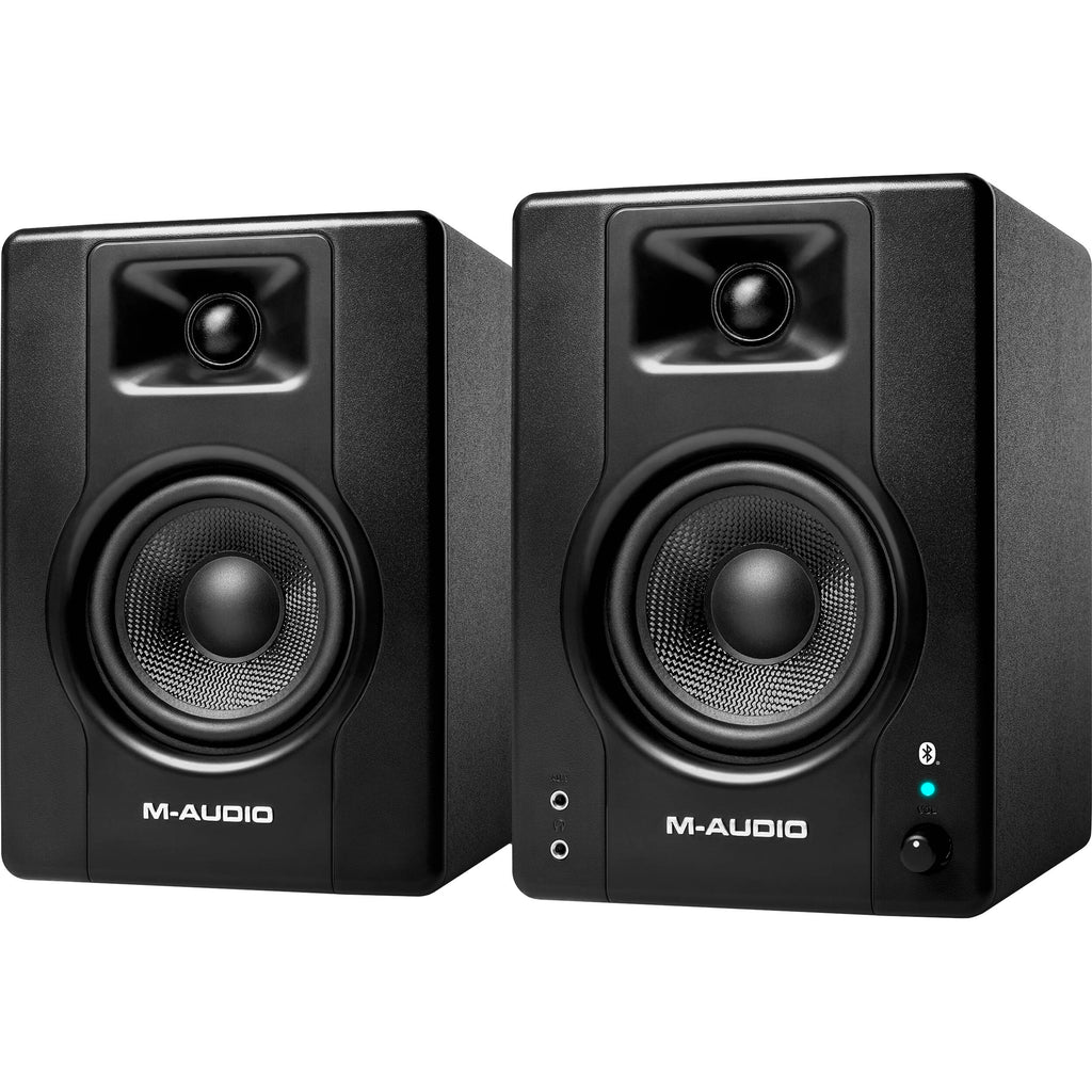 M-Audio BX4 BT desktop speakers with black finish and control knobs, designed for high-quality audio monitoring.
