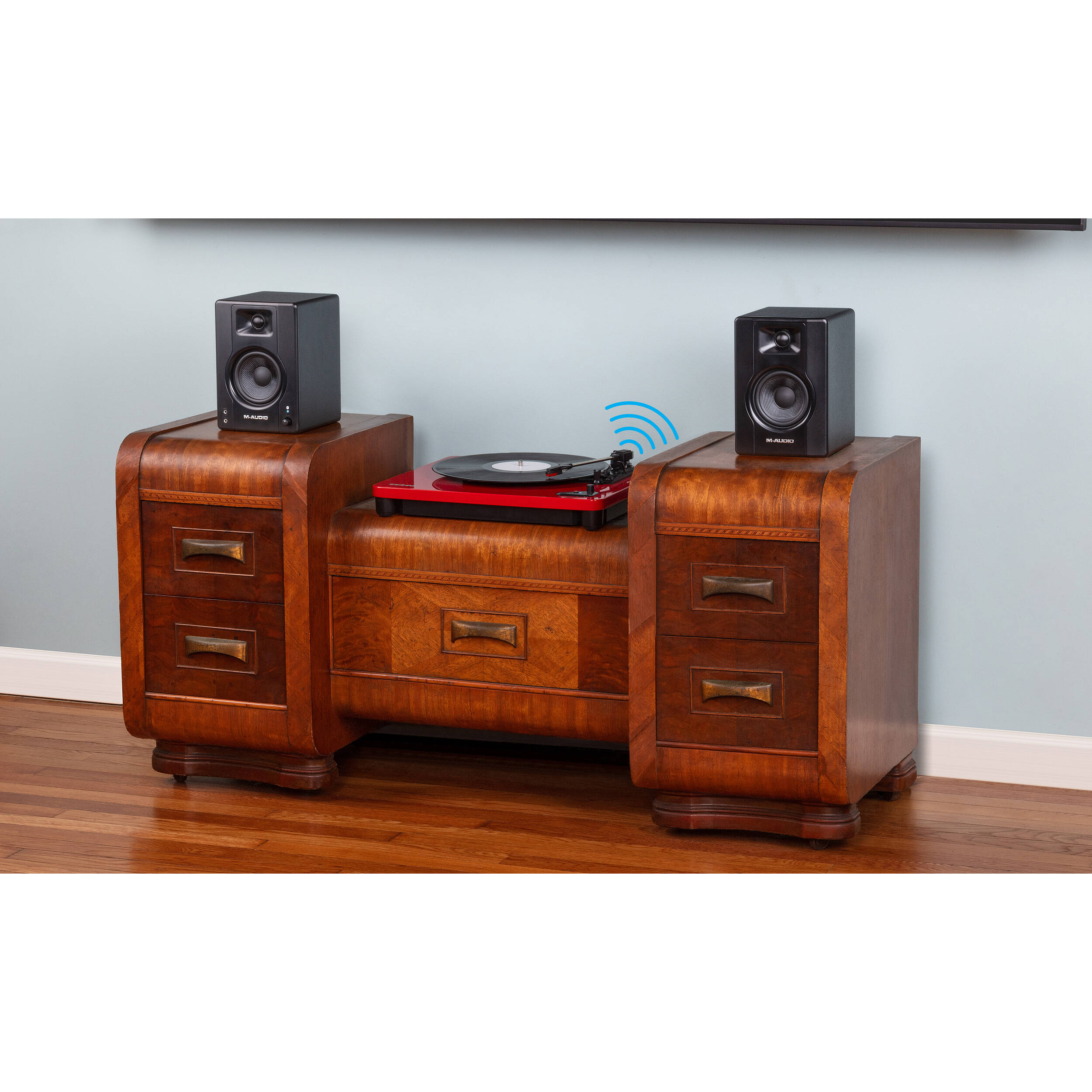 M-Audio BX4 BT desktop speakers with black finish, compact design, and front-facing controls for high-quality audio output.