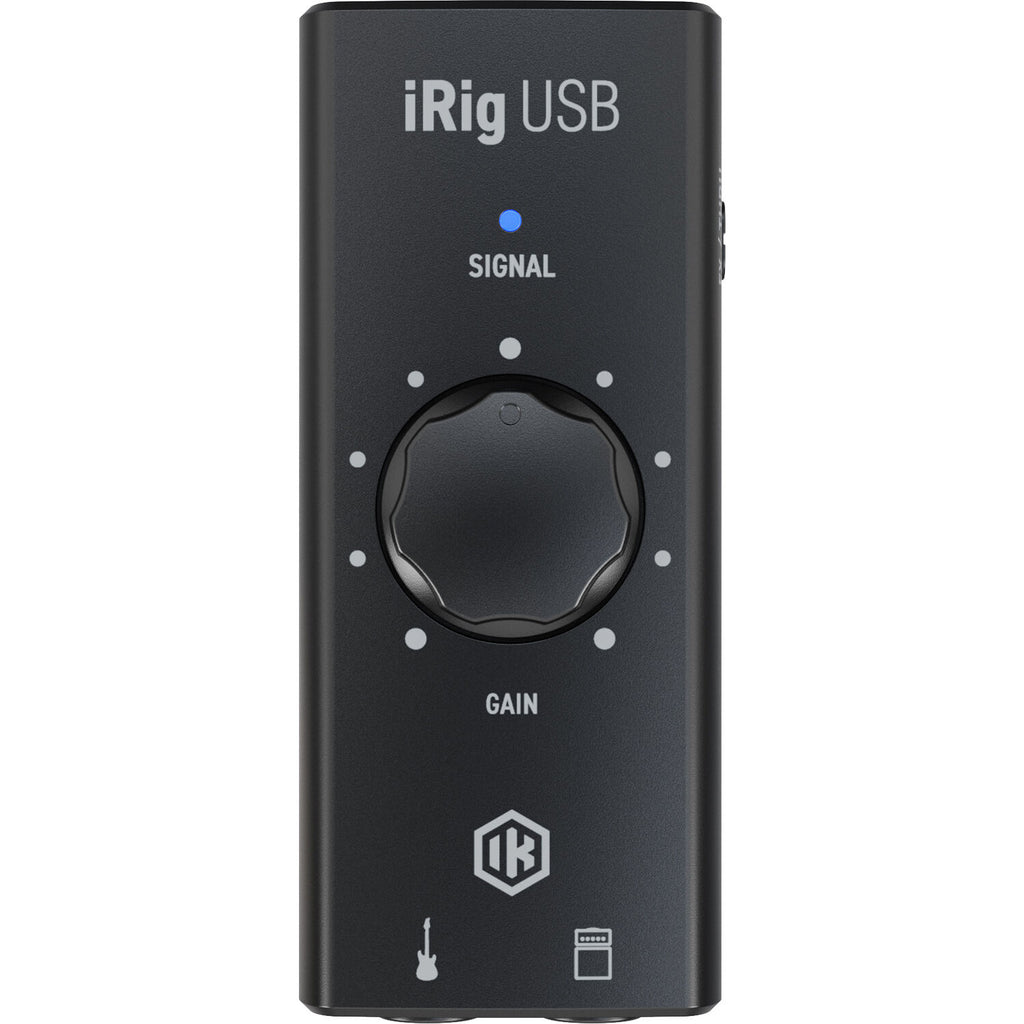 IK Multimedia iRig USB audio interface with input and output ports, compact design for mobile recording and sound setup.