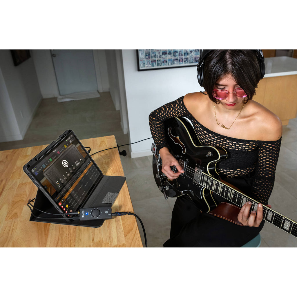 IK Multimedia iRig USB audio interface with input and output ports for connecting musical instruments and microphones to computers