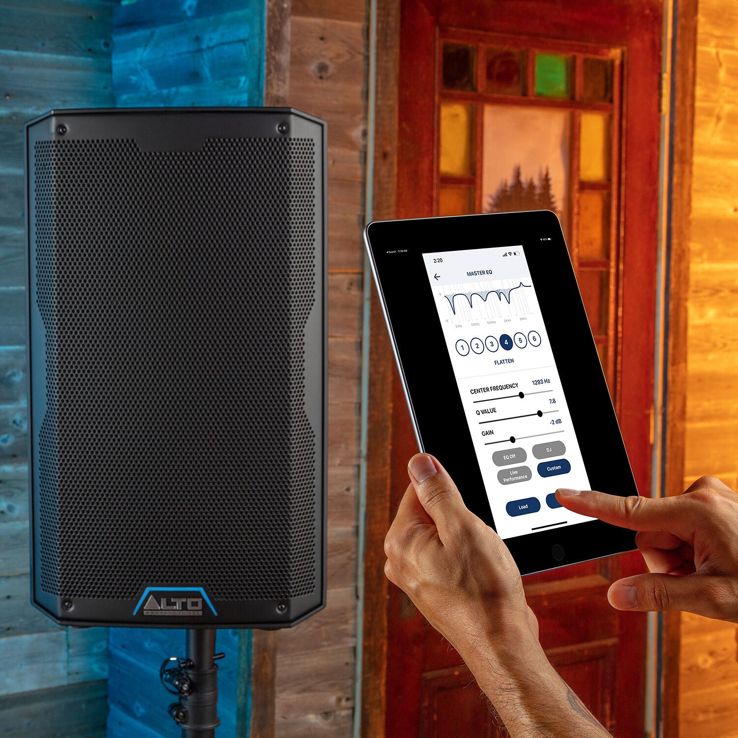 Alto Professional TS408 PA speaker system with two black speaker cabinets and control panels for live sound applications.