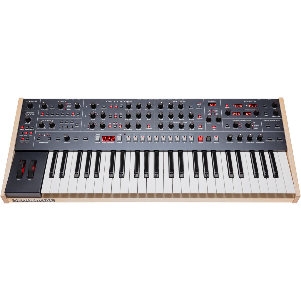 Sequential Trigon-6 synthesizer with keyboard and control panel, showcasing its compact design and interface.