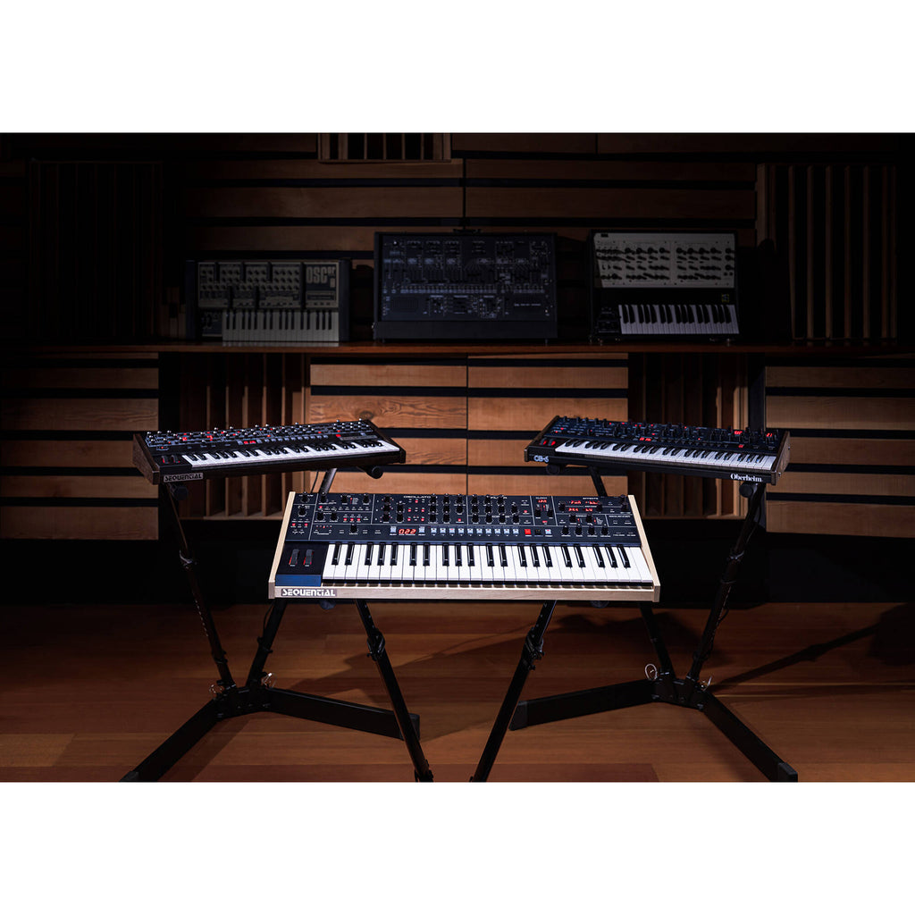 Sequential Trigon-6 synthesizer with multiple knobs, buttons, and a sleek black design, showcasing its compact and modern interface.