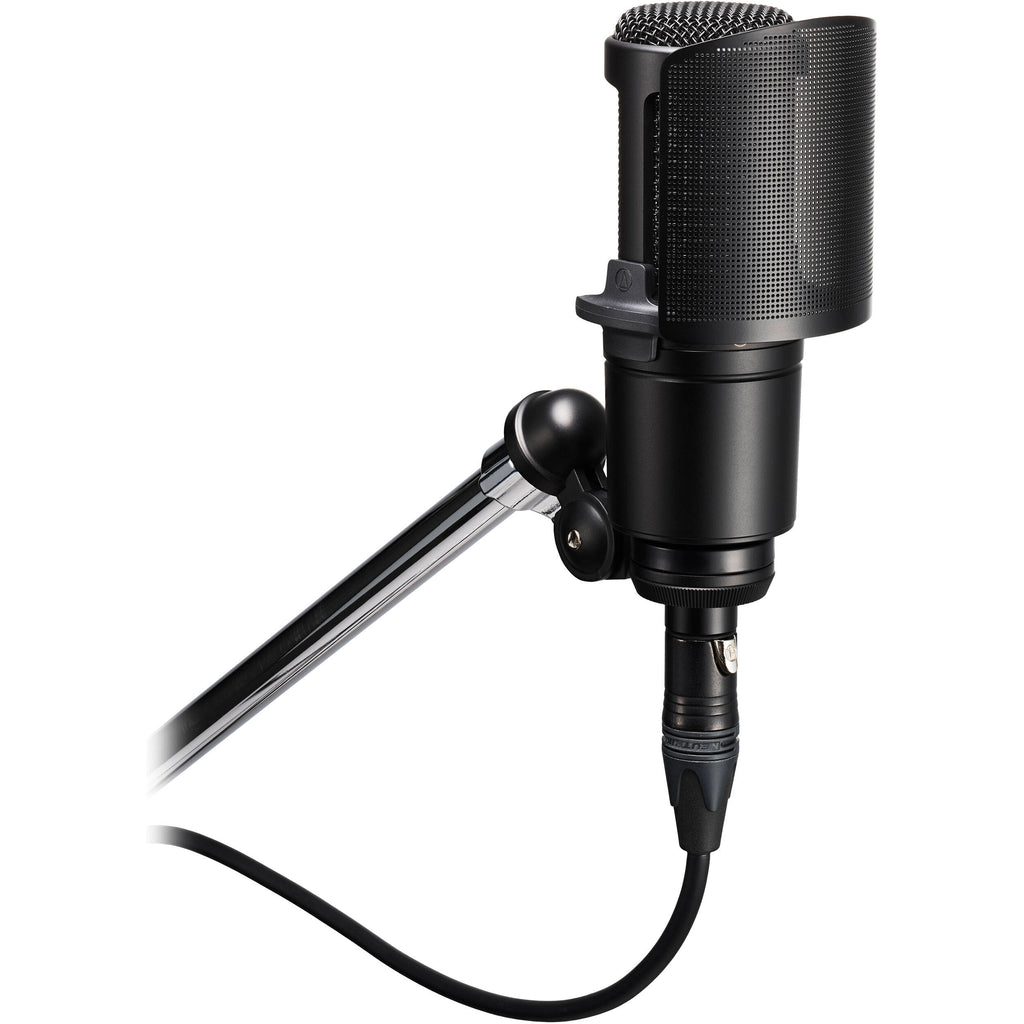 Audio Technica AT8175 microphone pop filter attached to a microphone for reducing plosive sounds during recording session.