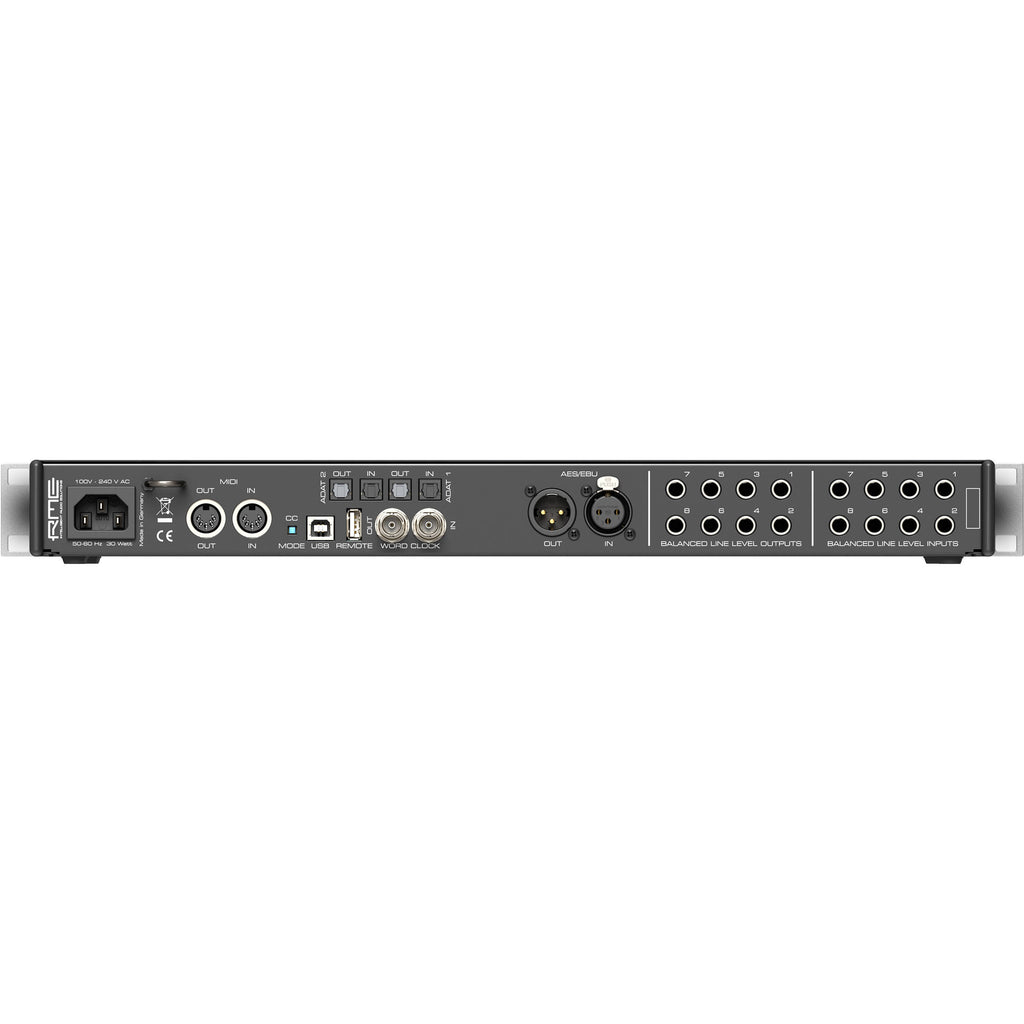 RME Fireface 802 FS audio interface with multiple input/output ports and professional audio controls on a desktop.