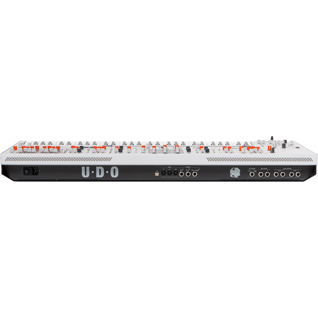 UDO Audio Super Gemini synthesizer with multiple knobs, keys, and control panel, showcasing its vintage-inspired design and features.