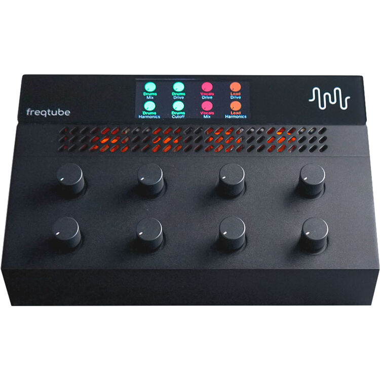 Freqport FreqTube FT1 effects pedal accessory with control knobs and input/output jacks for guitar or bass.