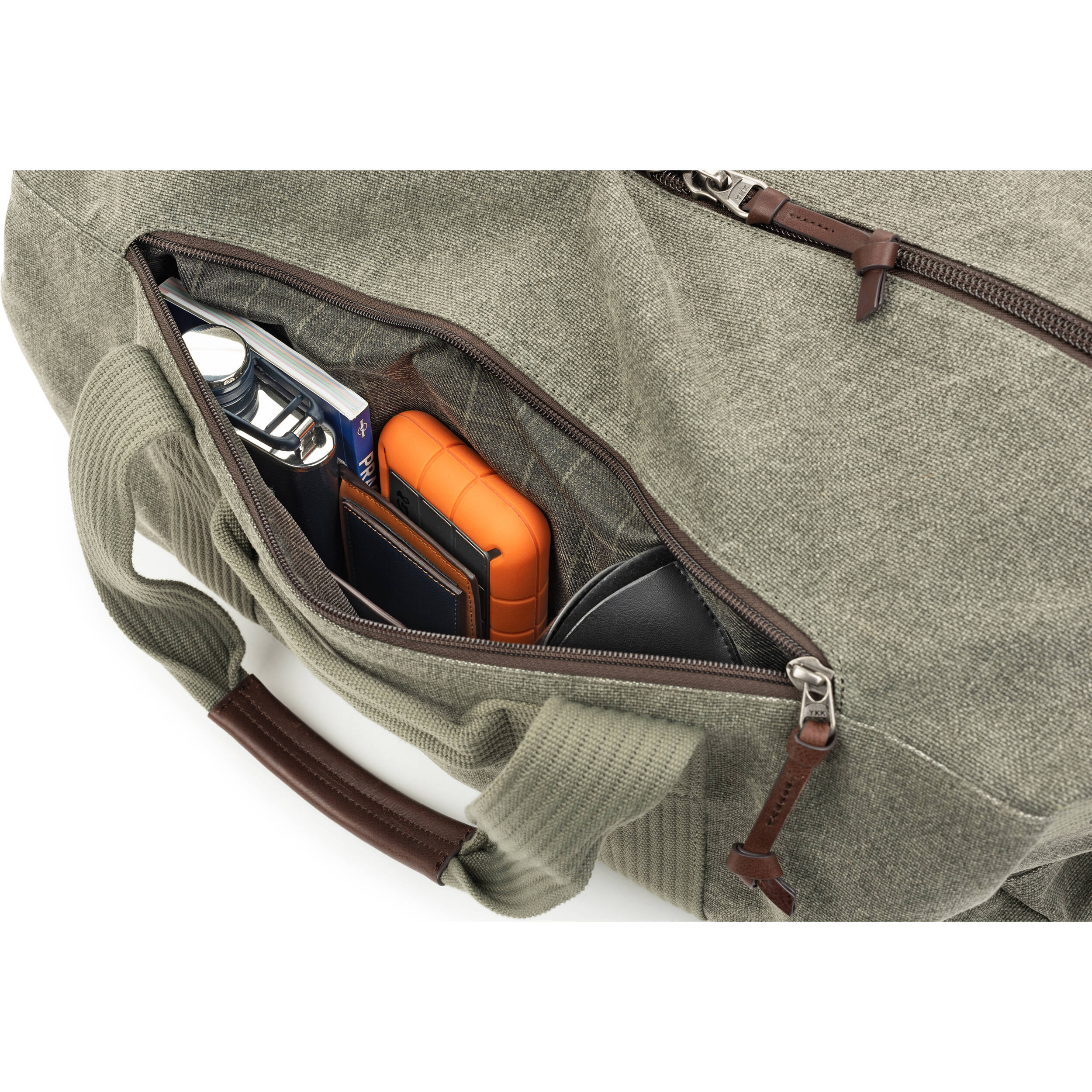 Think Tank Retrospective Duffel, a durable video equipment bag with multiple compartments, black nylon exterior, and adjustable shoulder strap.
