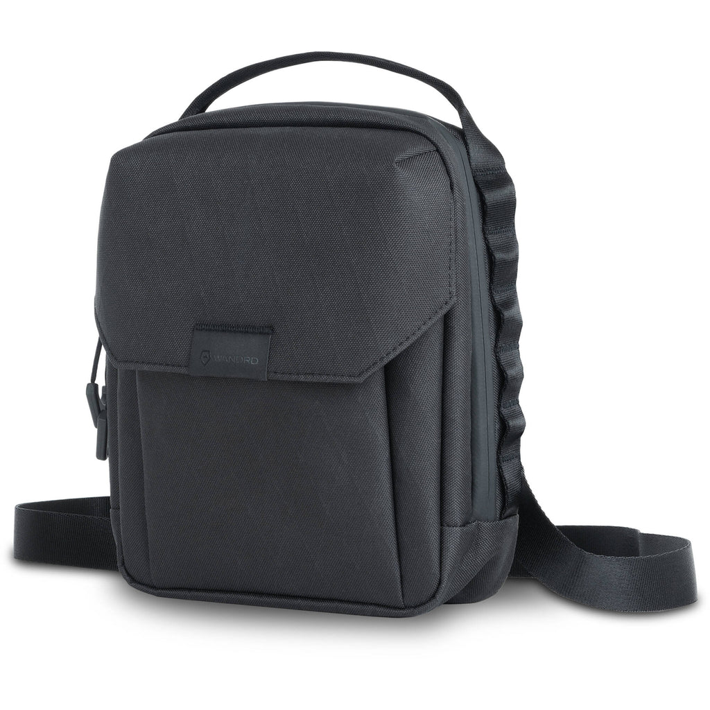 Wandrd X1 Cross Body video equipment bag with adjustable strap and padded compartments for camera gear and accessories.