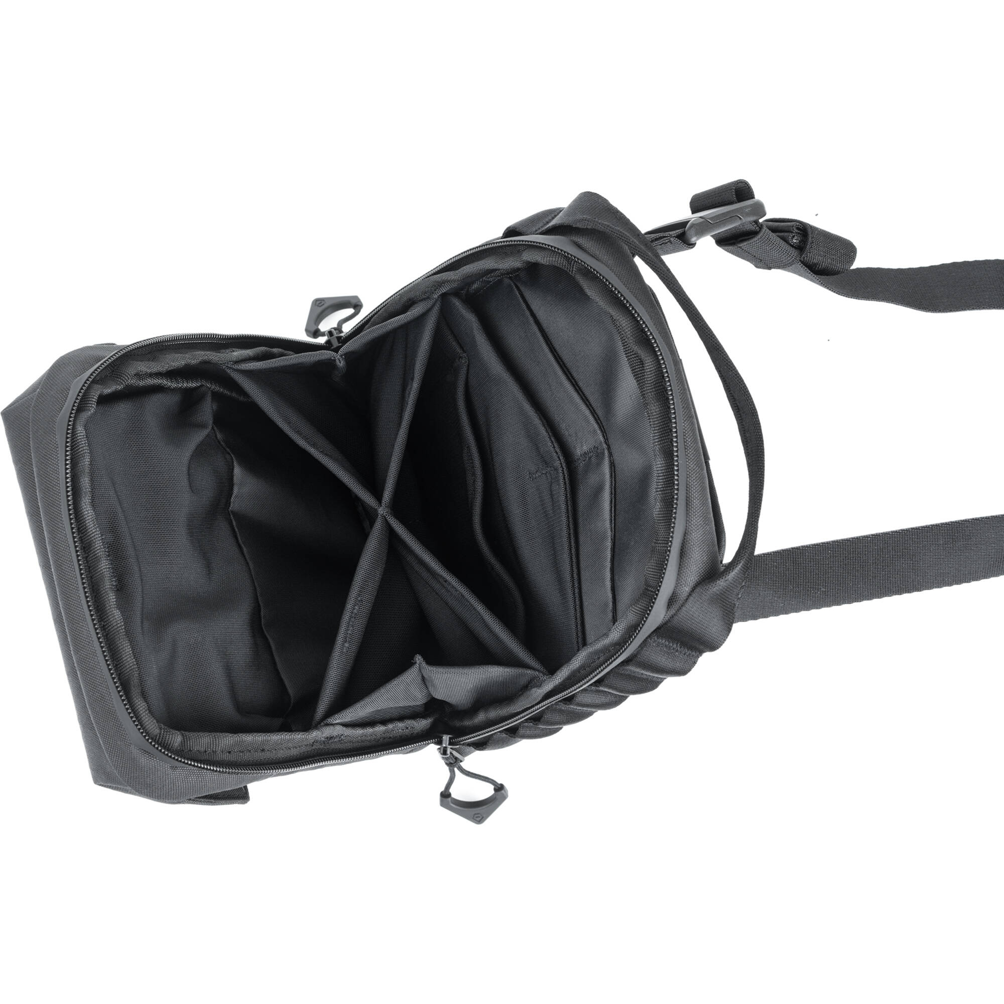 Wandrd X1 Cross Body video equipment bag with adjustable strap and padded compartments for cameras and accessories.
