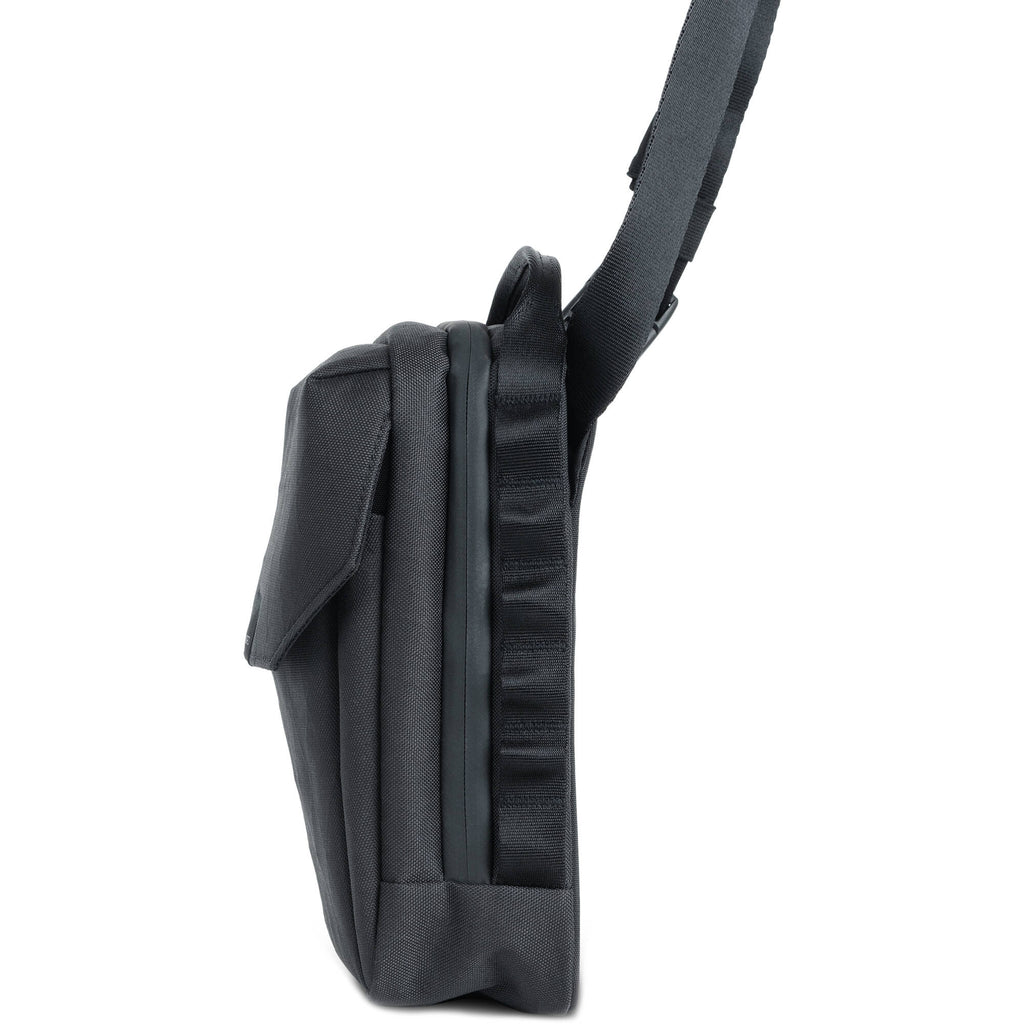 Wandrd X1 Cross Body video equipment bag with adjustable strap, padded compartments, and sleek black design.