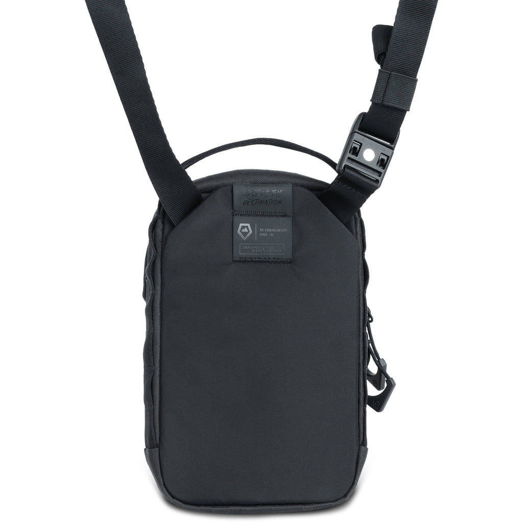Wandrd X1 Cross Body video equipment bag with padded compartments and adjustable strap for secure carrying.