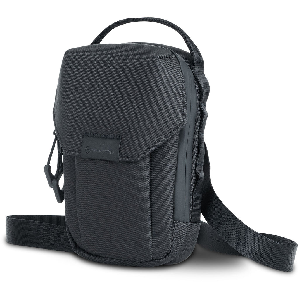 Wandrd X1 Cross Body video equipment bag with adjustable strap and multiple compartments for camera gear and accessories.
